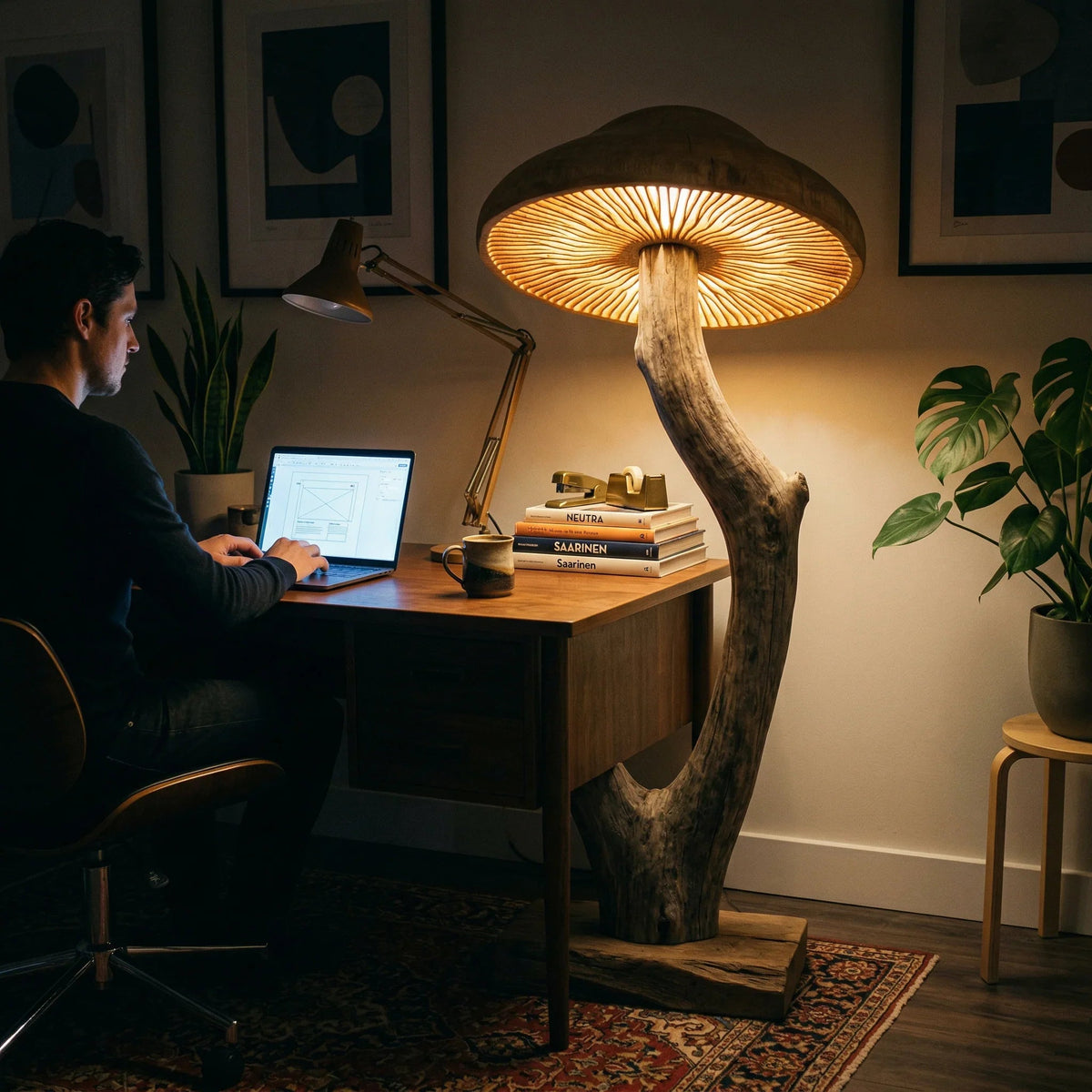 Curved driftwood mushroom floor lamp with glowing cap on reclaimed wood base in cozy office