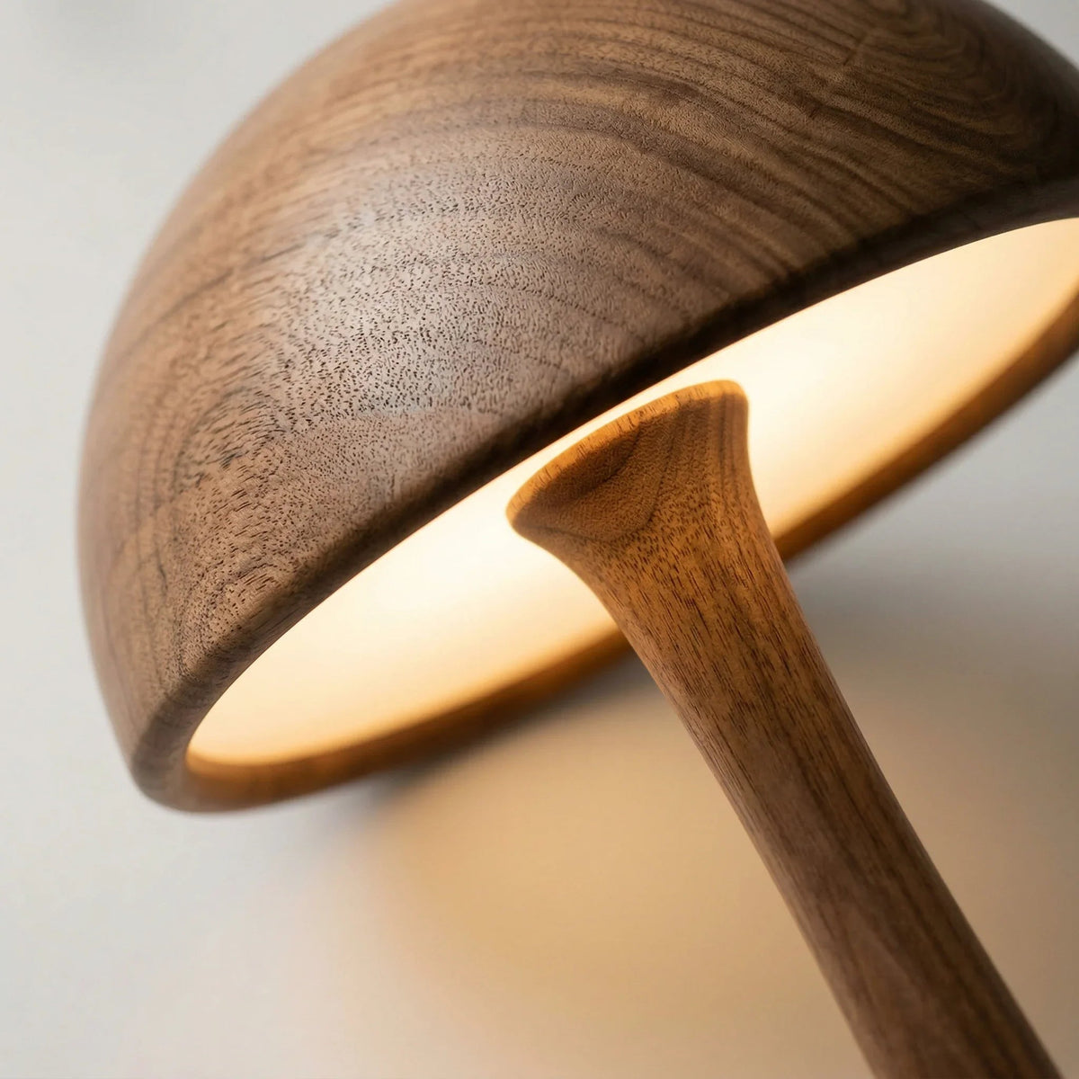 Solid wood mushroom floor lamp with glowing dome cap and tapered stem, modern design
