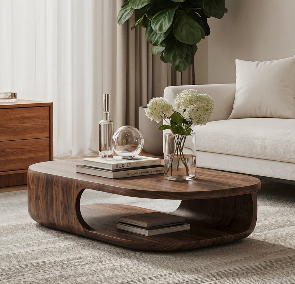 Organic curved coffee table crafted from premium solid wood with a lower shelf