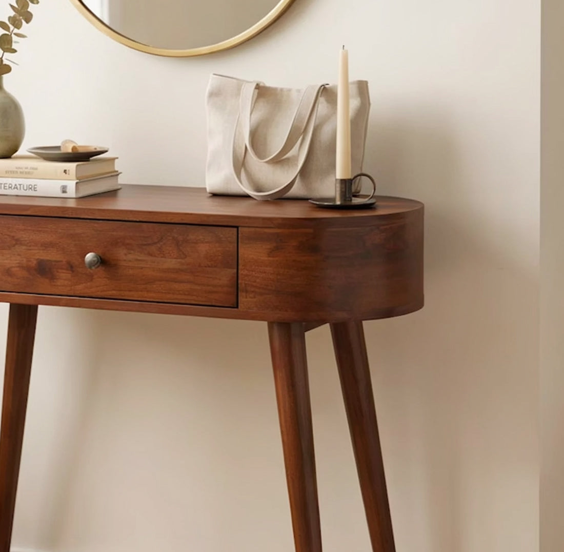 Modern Japandi solid wood console table featuring a curved silhouette and built-in drawer