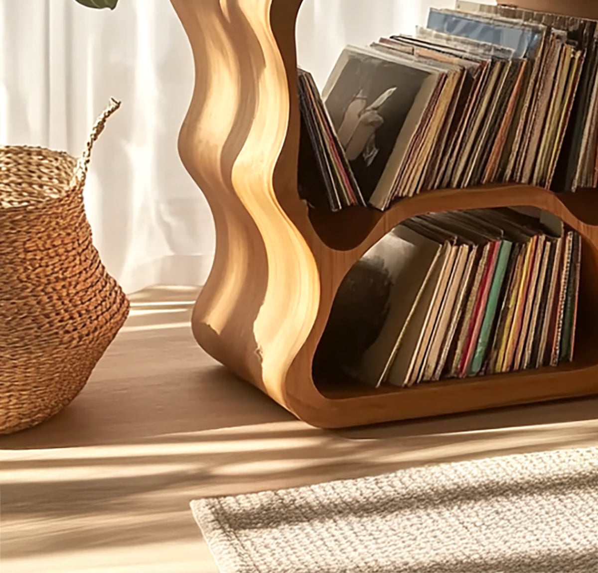 Unique solid wood record cabinet featuring curved wavy edges and two tiers of vinyl record storage