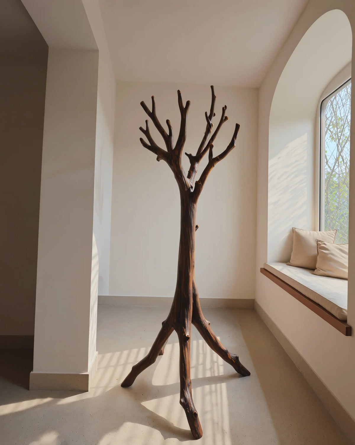Solid wood tree bookshelf with live edge design in a sunlit modern room